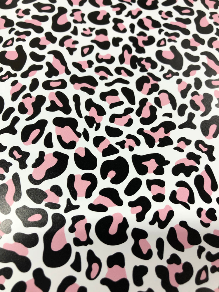 White and soft pink animal print